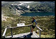 Patrycja standing beside Blue Lake
